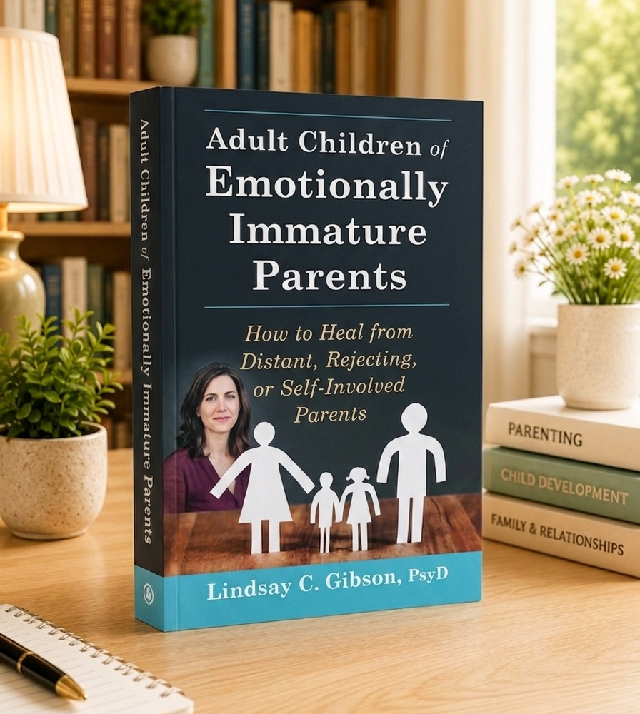 Book with blue cover, white title, and family-figure silhouettes.