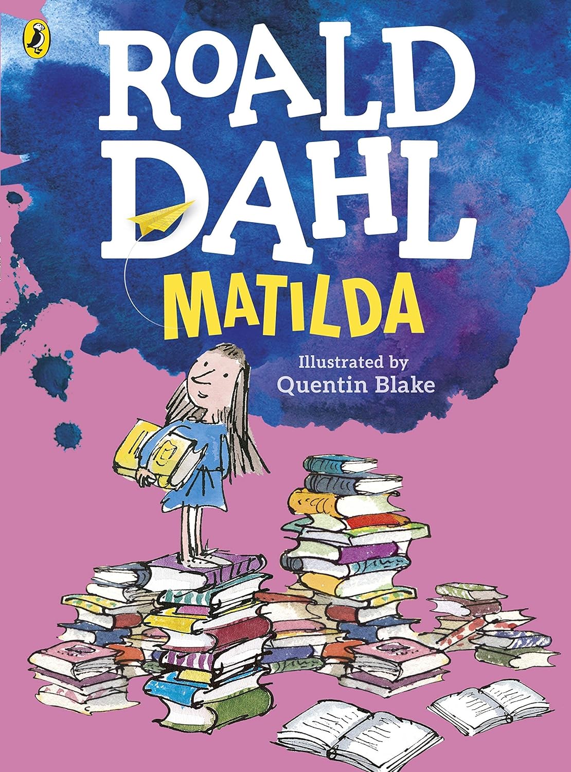 Matilda novel by Roald Dahl book cover with girl, stacked books, and title text