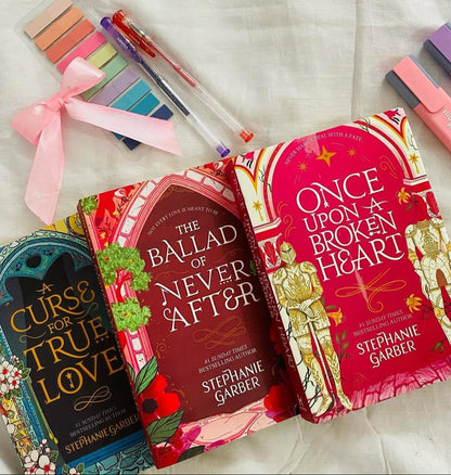 Set of 3 paperback fantasy novels with covers: Once Upon a Broken Heart, Never After, True Love