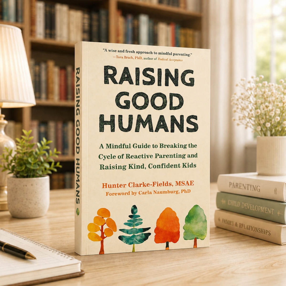 Raising Good Humans book with illustrated trees and flowers on the cover