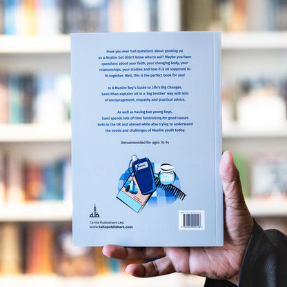 Softcover guide book back cover held in hand, illustrated icons and text blocks
